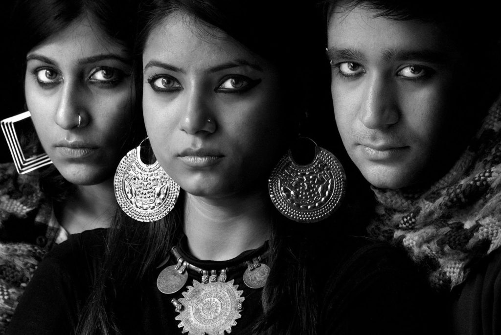 A portrait of Ambuja, Shikha & Adtiya.